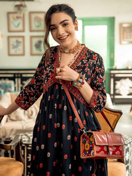 Women Floral Printed Black & Orange A-Line Ethnic Dress
