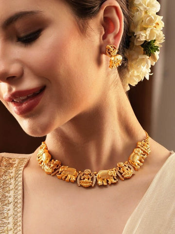 Women Gilded Elegance Gold-Plated AD-studded Lakshmi Designer Necklace & Earrings VitansEthnics