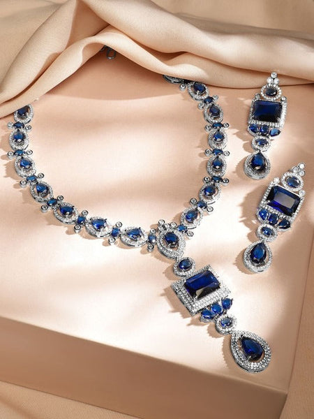 Women Rhodium-Plated Blue Sapphire & White Cubic Zirconia Studded Luxe Jewellery Set VitansEthnics